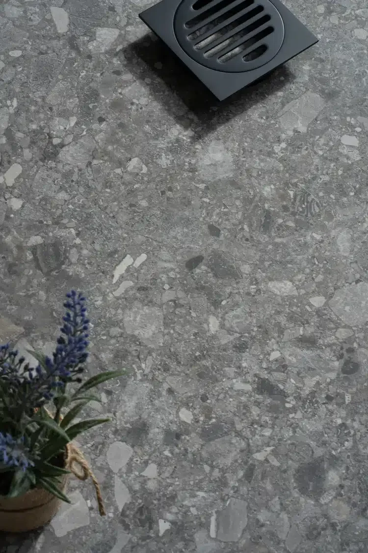 Grey speckled floor tile with lavender